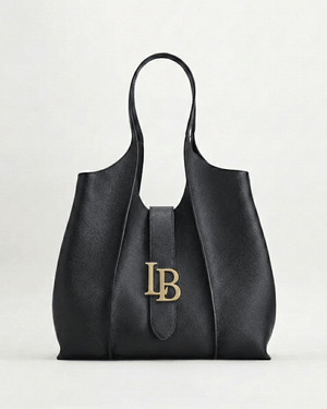 Black vegan leather shoulder bag white background 