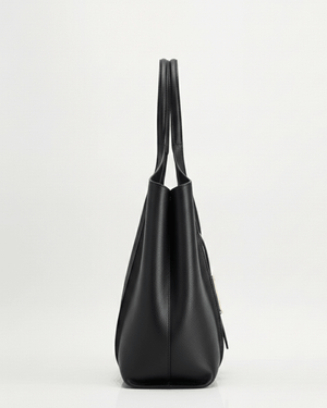 Black vegan leather shoulder bag side view white background
